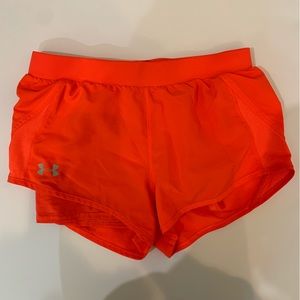 Under armor shorts with built in spandex size small, coral/red